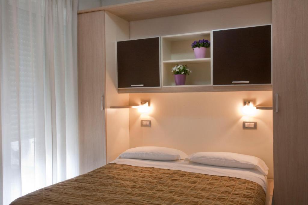 Residence Il Tulipano Ριτσόνε Δωμάτιο φωτογραφία